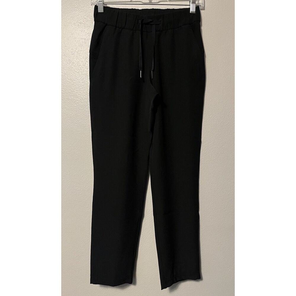 Lululemon On the Fly Pants Women's Size 2 Black Travel Woven Drawstring Pockets